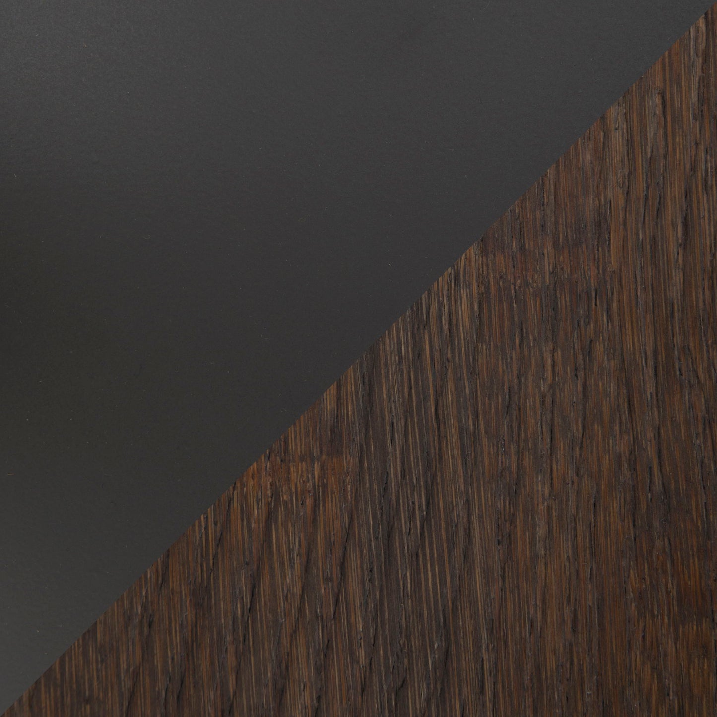A diagonal split image displays the Dakota - Industrial Adjustable Bar Dinette Table: matte black surface on the top left, and textured dark brown wood on the bottom right.