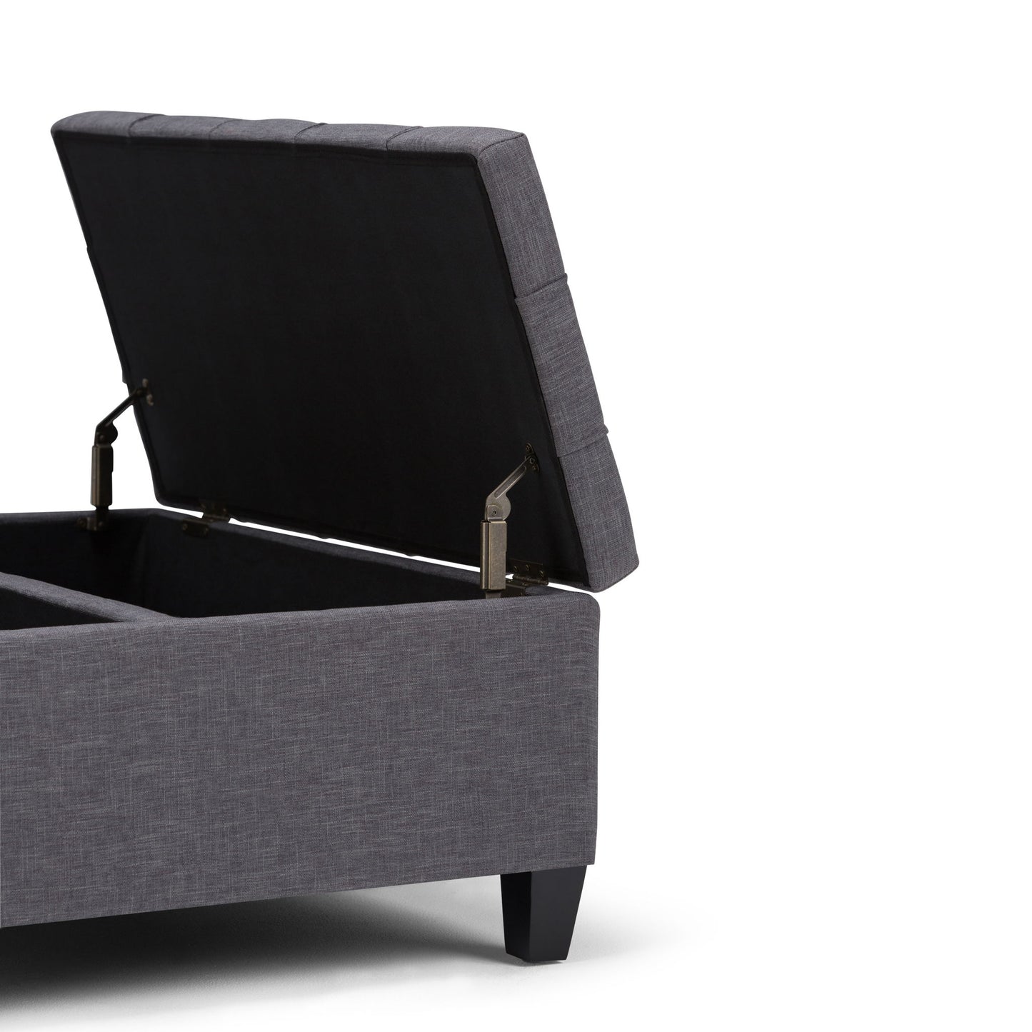 The Harrison Upholstered Coffee Table Storage Ottoman, shown in gray with a hinged lid open to reveal interior storage, features short black legs and is displayed against a white background.