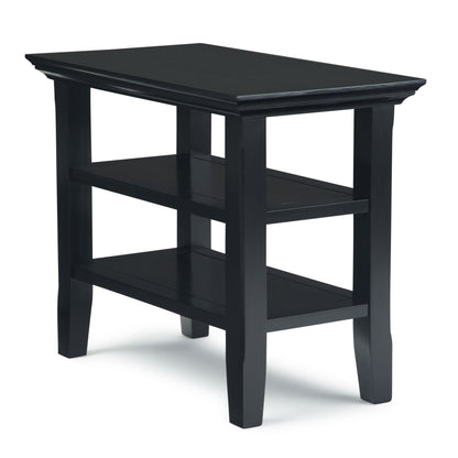 The Acadian - Narrow Side Table, Handcrafted, is a black wooden table with a rectangular top and two lower shelves, four straight legs, and a simple modern design. It is photographed against a white background.