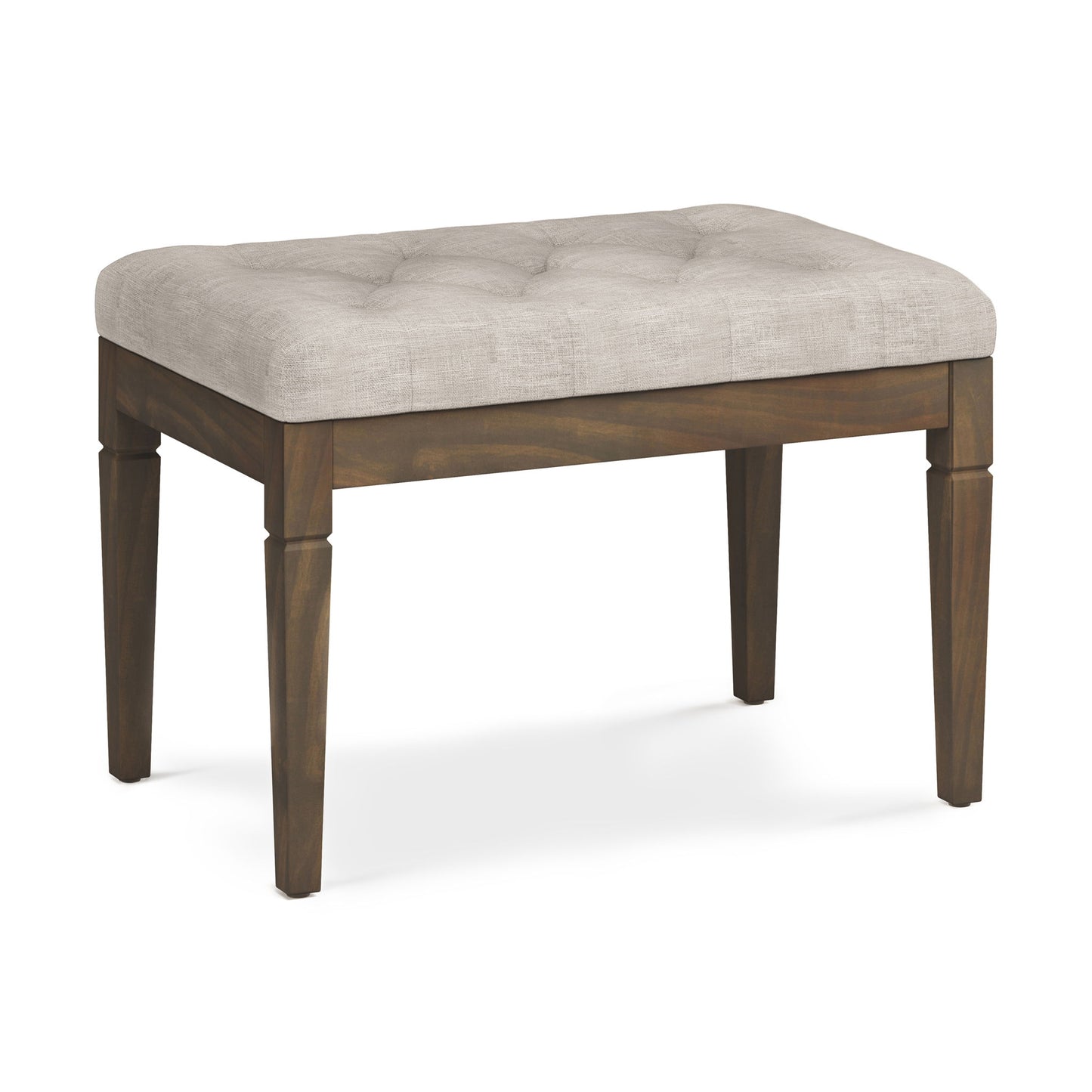 The Waverly Upholstered Tufted Ottoman Bench features four tapered wooden legs and a light beige padded tufted cushion, offering simple elegance for your bedroom or living area.