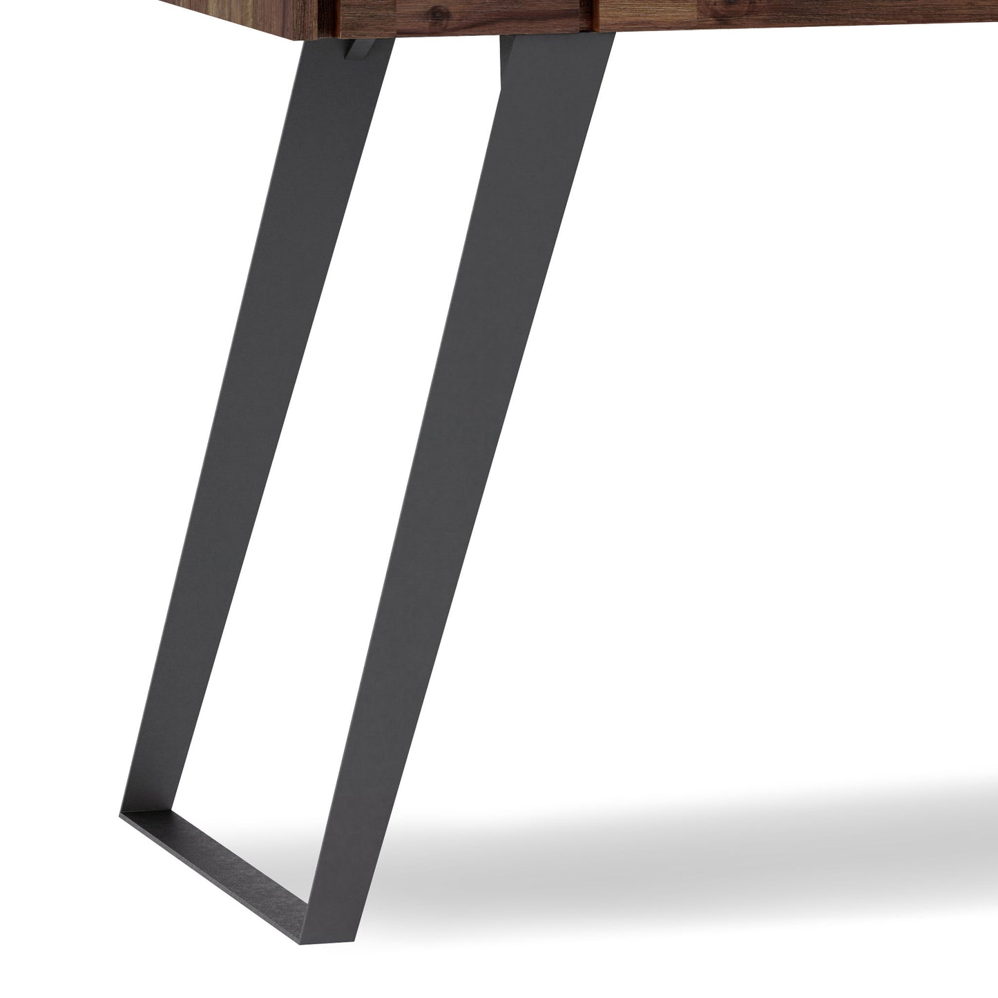 Close-up of the Lowry - Handcrafted Desk's black metal leg featuring an angled, geometric design, attached to its wooden tabletop against a white background.