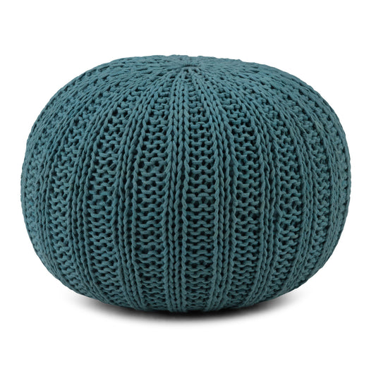 The Shelby Handcrafted Hand Knit Round Pouf features a chunky, ribbed knit texture in teal and is displayed against a white background.
