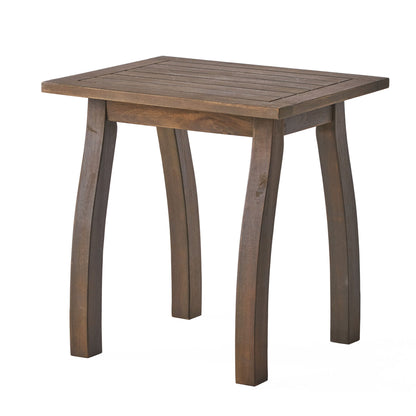 The Kinesis Outdoor Side Table features a slatted rectangular top and four slightly curved legs, all crafted from wood, shown against a plain white background.