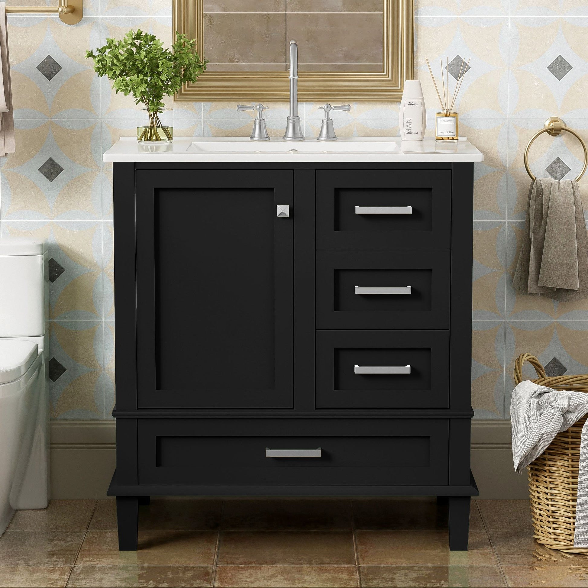 The Modern Bathroom Vanity Combo Set features a solid wood frame, soft closing door, 3 drawers, and a white sink with silver faucets, topped by a mirror. Towels and a wicker laundry basket sit beside it against the tiled wall.