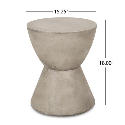 The Outdoor Hourglass Shaped Side Table in light gray features a minimalist concrete design with a smooth round top, hourglass silhouette, and measures 15.25" in diameter by 18" high—ideal for modern outdoor spaces.