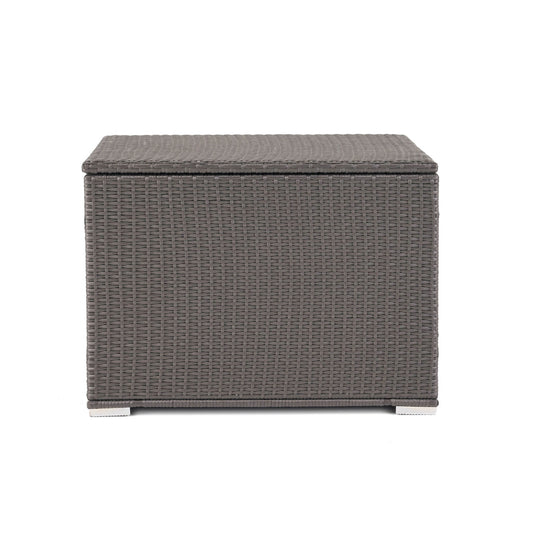 The Santa Rosa - Storage Table is a rectangular outdoor box made of grey woven rattan, featuring a flat lid and short feet, shown against a plain white background.
