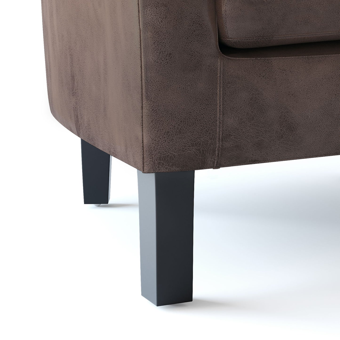 Close-up view of the corner of the Austin - Handcrafted Tub Chair, featuring brown textured upholstery and two black rectangular legs, displayed on a white background.
