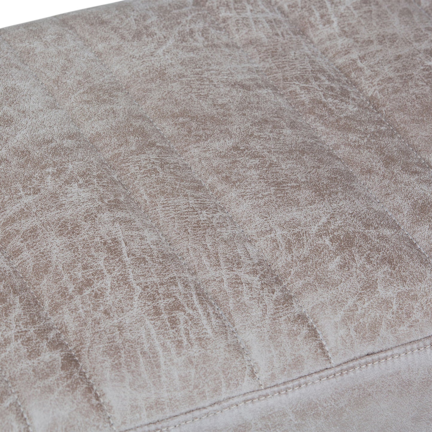 Close-up of the Salinger Large Upholstered Ottoman Bench’s textured light brown faux leather with subtle creases, visible stitching, and a distressed vintage look.