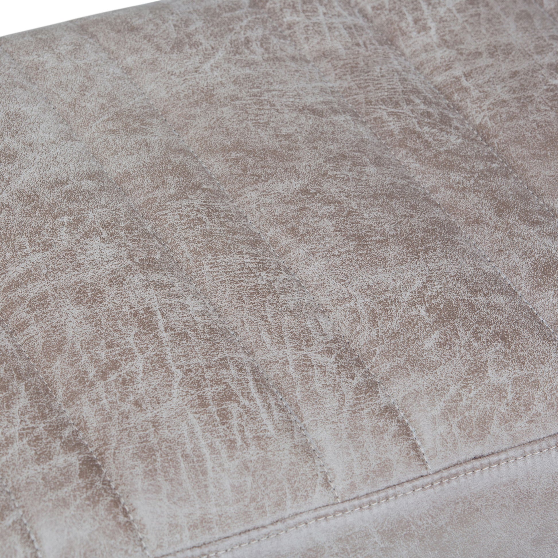 Close-up of the Salinger Large Upholstered Ottoman Bench’s textured light brown faux leather with subtle creases, visible stitching, and a distressed vintage look.