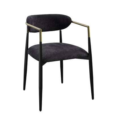 The Jaramillo Chenille Side Chair (Set of 2) in black features slender metal legs, a curved backrest, brass-accented armrests, and dark chenille upholstery on the seat and back. Each chair stands on four tapered legs for a modern look.