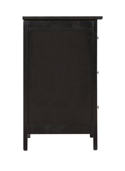 The Daniel - 3 Drawer Nightstand is a black wooden cabinet with a smooth, flat top, four legs, and three knobs on the right side, viewed from the side.