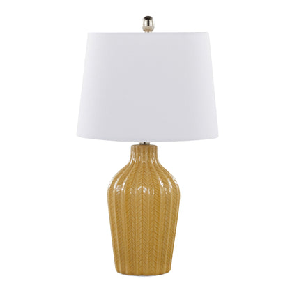 The Rockwell Contemporary Table Lamp (Set of 2) features a glossy mustard yellow ceramic base with a chevron pattern, topped with a simple white lampshade and finished with a metallic finial.