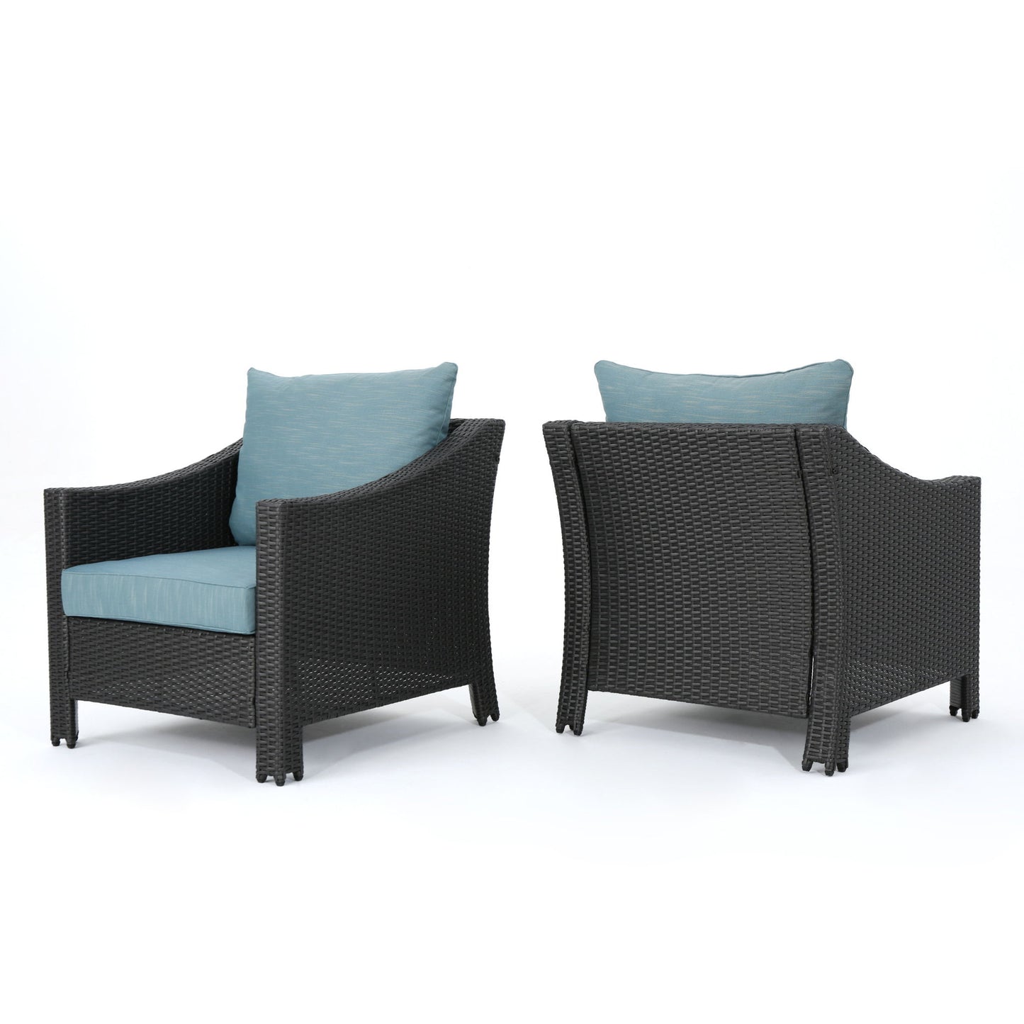 Two Antibes armchairs with water-resistant teal cushions and pillows are displayed on a white background; one faces forward, while the other shows the back.