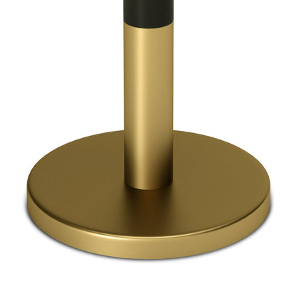 A close-up of the Evans Marble Side Table in white, featuring a round metallic gold base and vertical support, set against a white background.