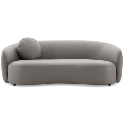 The Porter - Comfortable Sofa features a modern, light gray design with smooth upholstery, a single round cushion on the left, a low back, and rounded armrests.