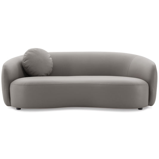 The Porter - Comfortable Sofa features a modern, light gray design with smooth upholstery, a single round cushion on the left, a low back, and rounded armrests.