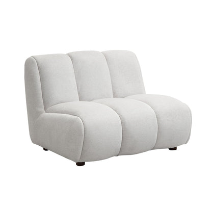 The Couch.com Manilla Linen Chair in Ivory White features a durable fabric design with a plush, segmented look, armless silhouette, and rounded edges, set on low-profile black feet and shown against a plain white background.