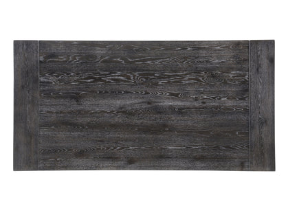 The Bernard - Weathered Dining Table features a rectangular tabletop with a dark wood grain finish, showcasing visible natural patterns and textures.