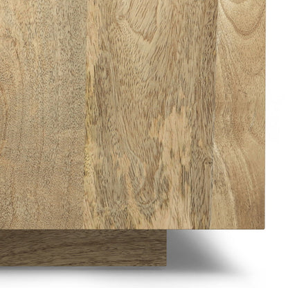 Close-up of the Lockhart Square Coffee Table in Natural, showing its light brown and beige wood tones, visible grain patterns, and natural texture where the tabletop meets the vertical panel at a right angle.