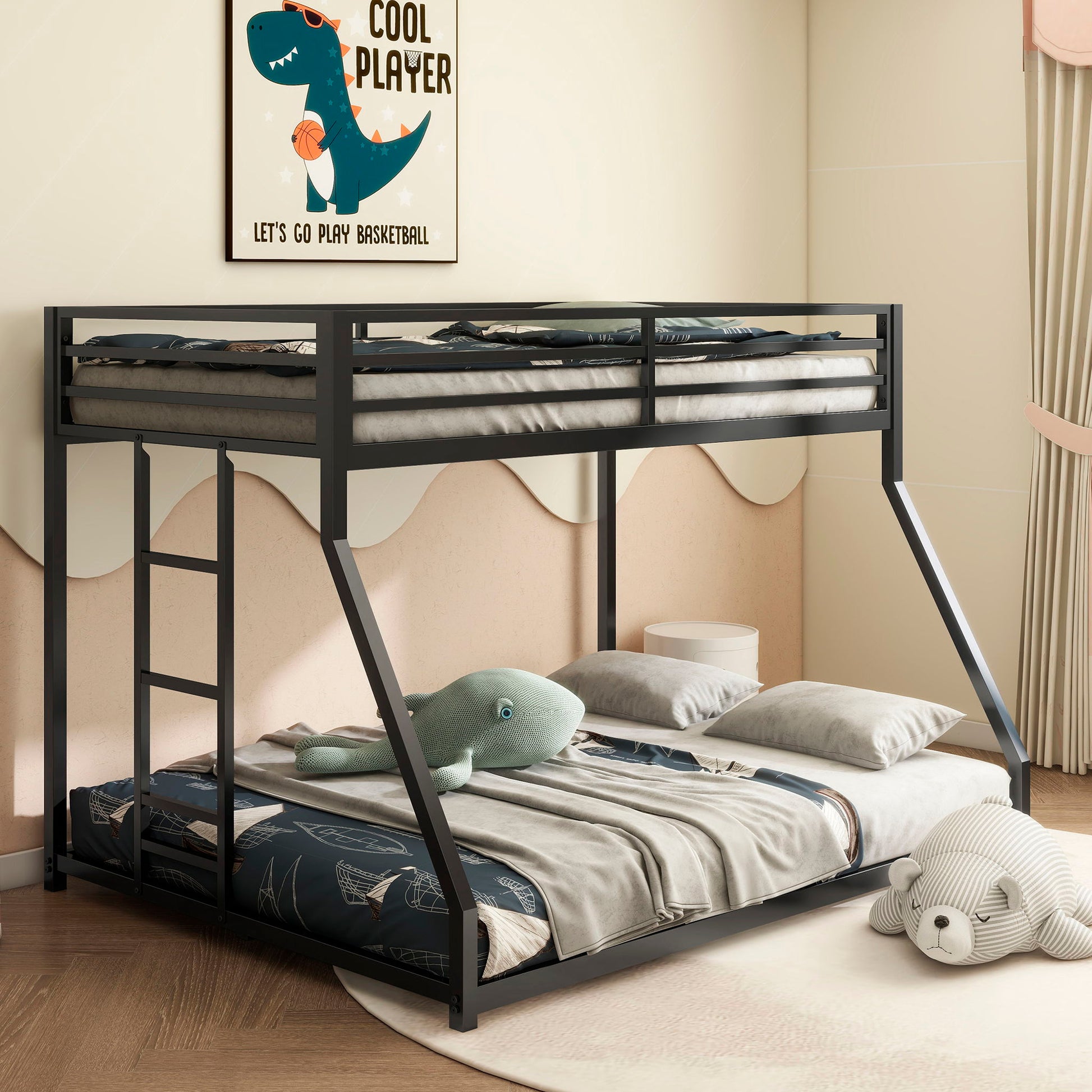The Adam - Bunk Bed in black metal is dressed in ocean-themed bedding, with a stuffed shark and bear on the lower bed. A “Cool Player” dinosaur poster hangs above, and the window to the right is framed by curtains.