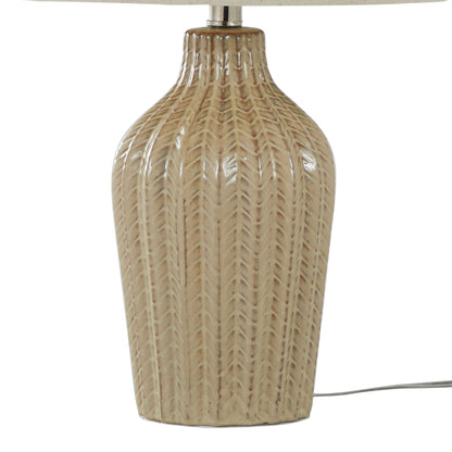 The Rockwell - Contemporary Table Lamp (Set of 2) features a beige ceramic base with a textured vertical herringbone pattern and glossy finish. A power cord is visible at the bottom right.