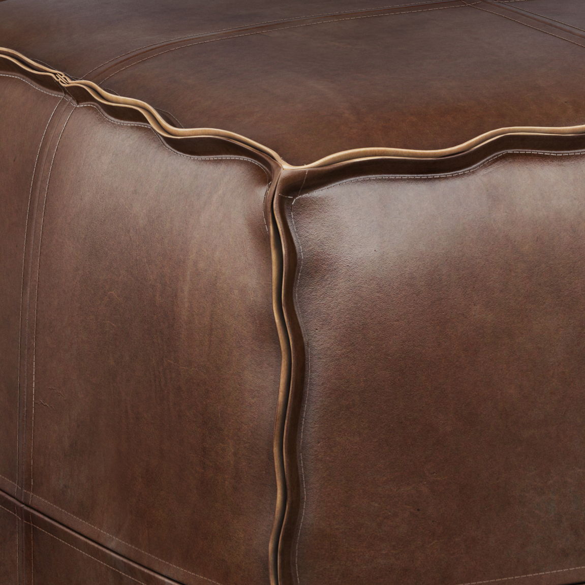 Close-up of the Brody - Versatile Square Pouf in brown leather, highlighting detailed stitching, neat edge seams, and a smooth yet subtly textured surface.