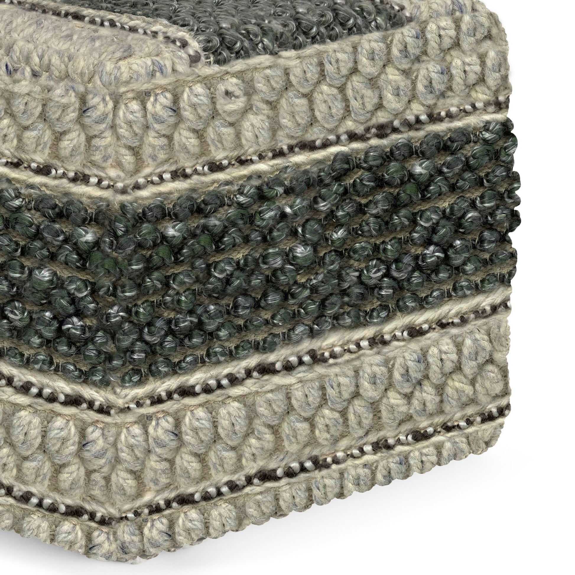 Close-up of the Grady - Handcrafted Square Pouf, featuring textured woven fabric in gray and dark green yarn with visible loops, braided patterns, and a distinct box-like corner.