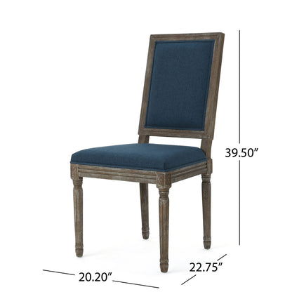 The Traditional Style Dining Chair features fabric upholstery on the seat and backrest, carved wooden legs, and measures 39.5"H x 20.2"W x 22.75"D.