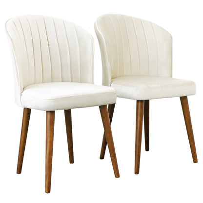 The Parsons Comfortable Dining Chair set includes two modern chairs with cream upholstery, vertical stitching, and angled wooden legs in a mid-century design, placed side by side.
