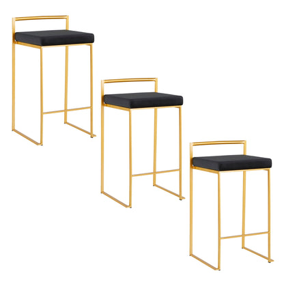 A set of two Fuji Contemporary/Glam Design Counter Stools with gold metal frames, black cushioned seats, and low backrests are arranged in a staggered formation on a white background.