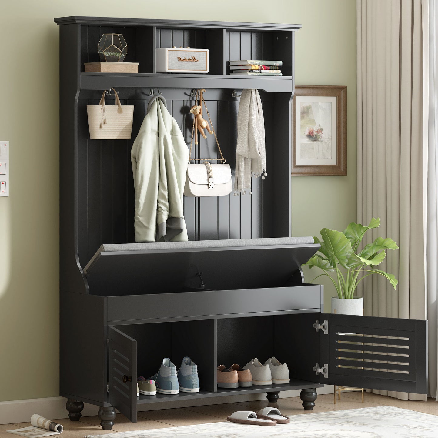A 5 in 1 entryway bench with shutter-shaped doors, coat rack, cushioned seat, and 4 sturdy hooks offers open storage and bottom cubbies for shoes. Nearby are a potted plant and framed artwork. Perfect for hallway or living room organization.