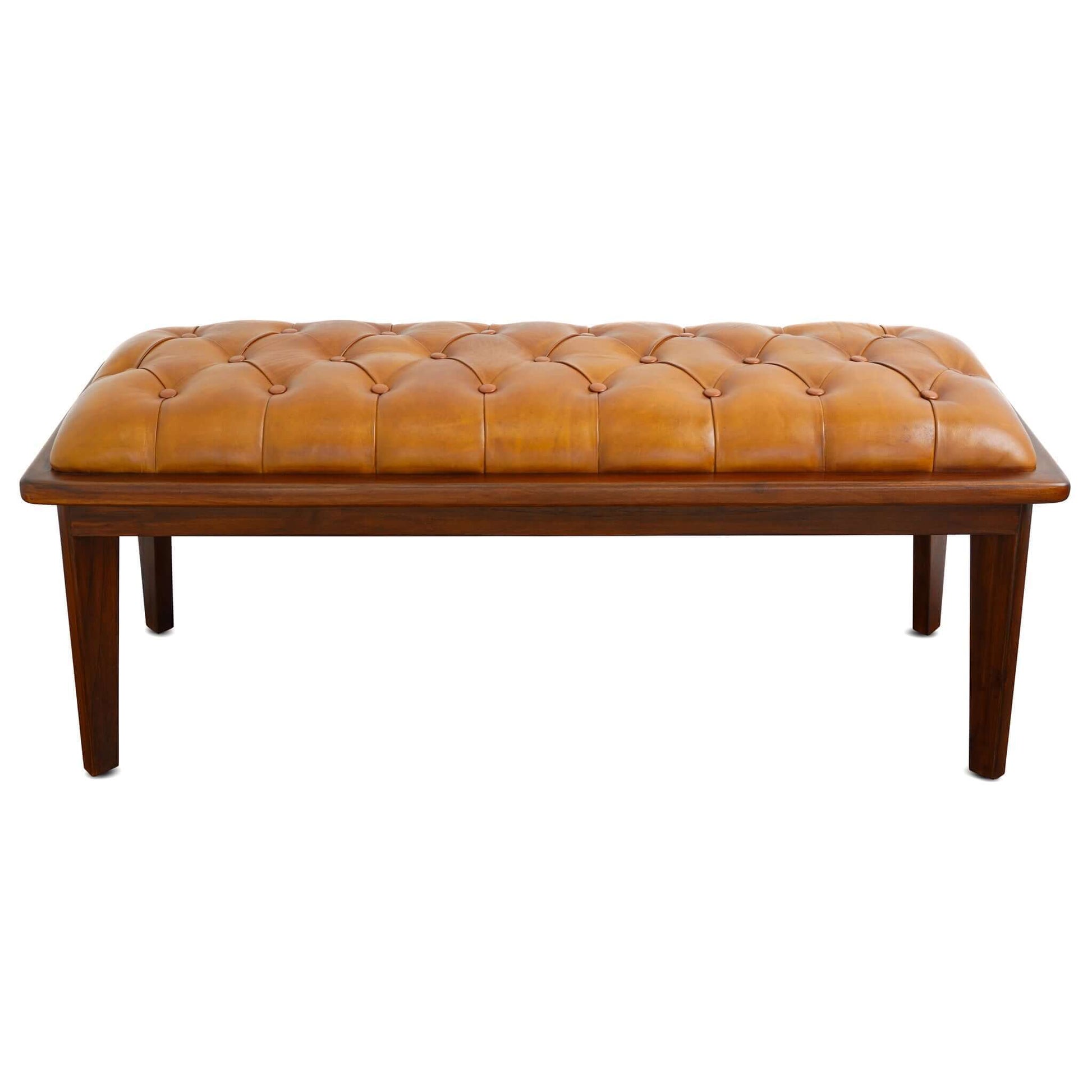 The Arden Bench With Buttons features rustic tan leather upholstery, button tufting, and dark wooden legs, shown from the front against a white background.