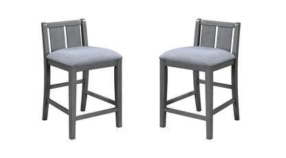 The Graham set includes two 20" counter height chairs with upholstered seats, gray slatted backrests, straight legs, and footrests. Displayed against a white background, they boast a sleek, modern design.