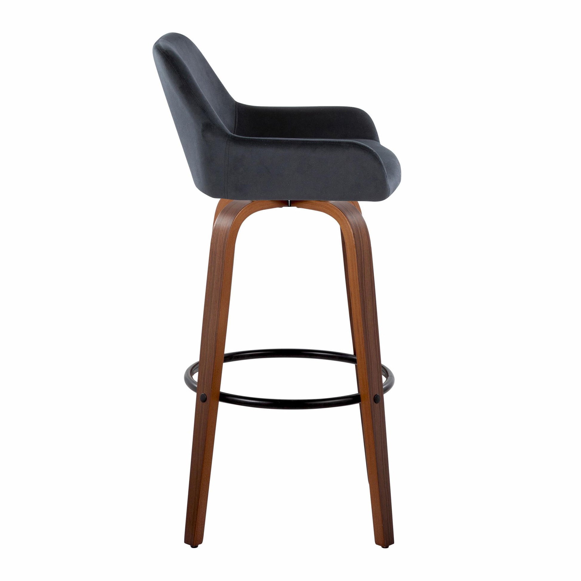 The Daniella Contemporary Barstool features a curved dark upholstered seat, wooden legs, and a round black metal footrest, shown in side profile on a white background. Sold as a set of 2 with fixed height and swivel functionality.