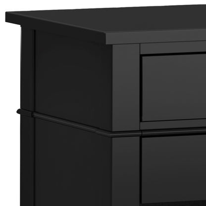 Close-up of the upper left corner of the handcrafted Carlton Bedside Table, showing the top surface, part of the side panel, and two drawer fronts.