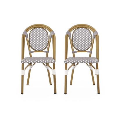 The Outdoor Rattan And Aluminum French Bistro Chair Set features two arched-back chairs with brown frames and woven gray and white checkered seats and backrests, shown against a white background.
