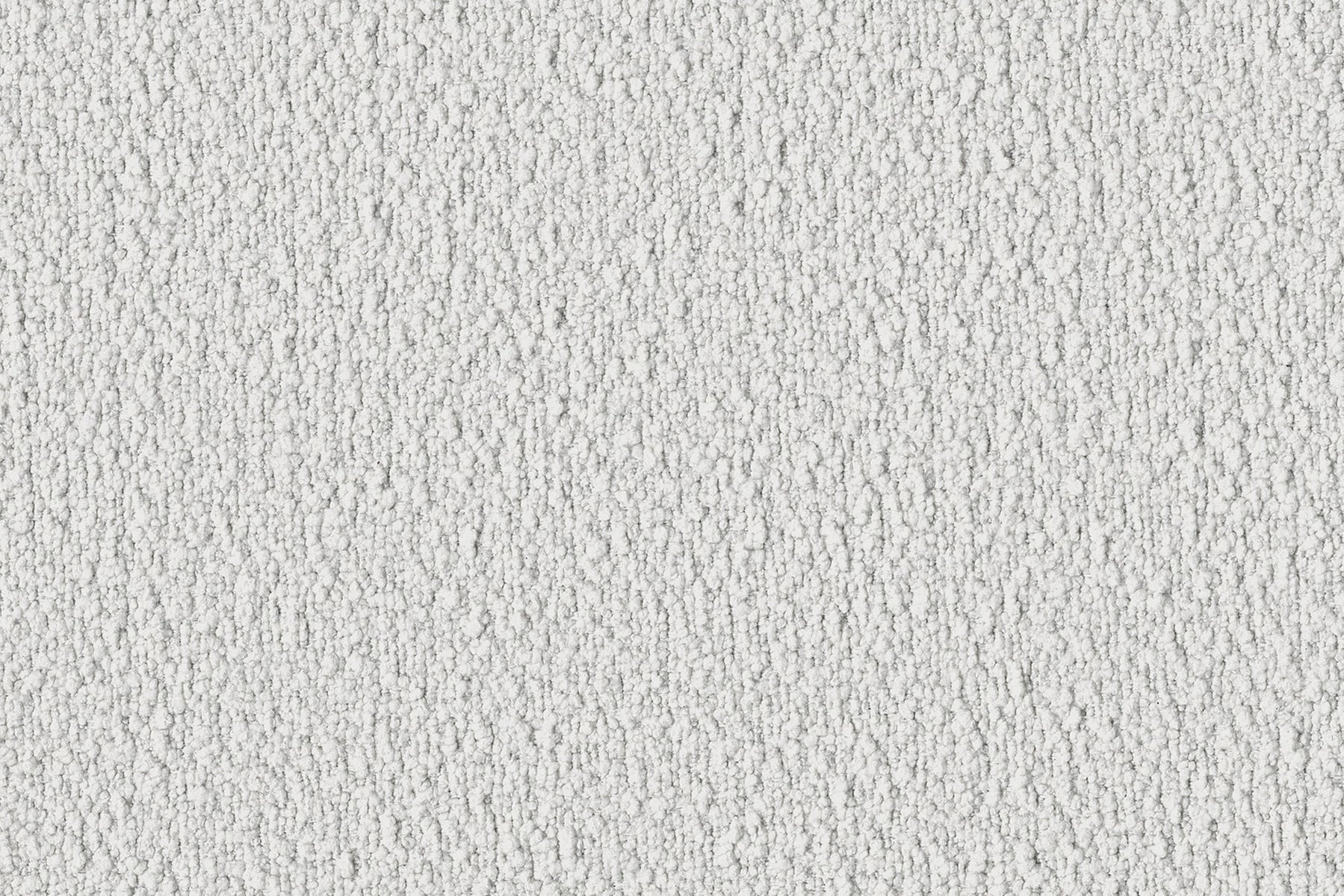 Close-up of the Dori Sofa by Acanva, showcasing its textured white fabric, featuring a rough, irregular pattern with small shadows creating a dappled effect. The surface appears slightly grainy, giving it a tactile, rustic appearance.