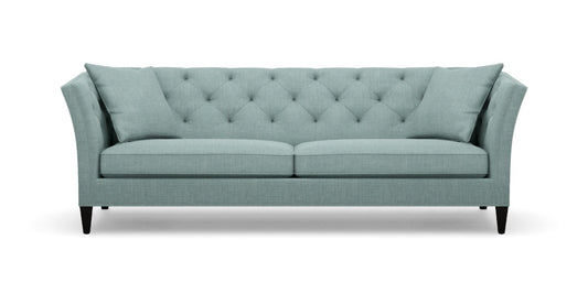 The Shelton 98" Sofa is teal with a tufted backrest and angled arms, featuring two seat cushions and four tapered black legs.