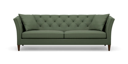 Introducing the Shelton 98" Sofa: This green, tufted sofa includes two seat cushions and two back pillows. It showcases a modern design with tall, angled armrests and tapered wooden legs.