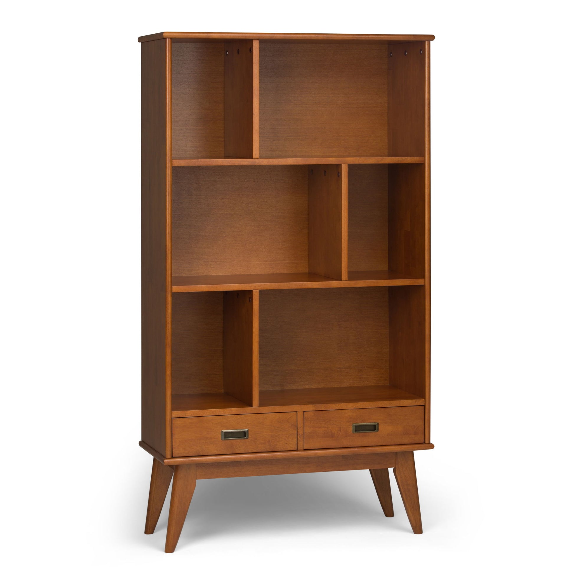 The Draper - Mid Century Wide Bookcase And Storage Unit features six open shelves in various sizes, two lower drawers, and four angled legs. Made from wood with a warm medium-brown finish for a stylish modern look.