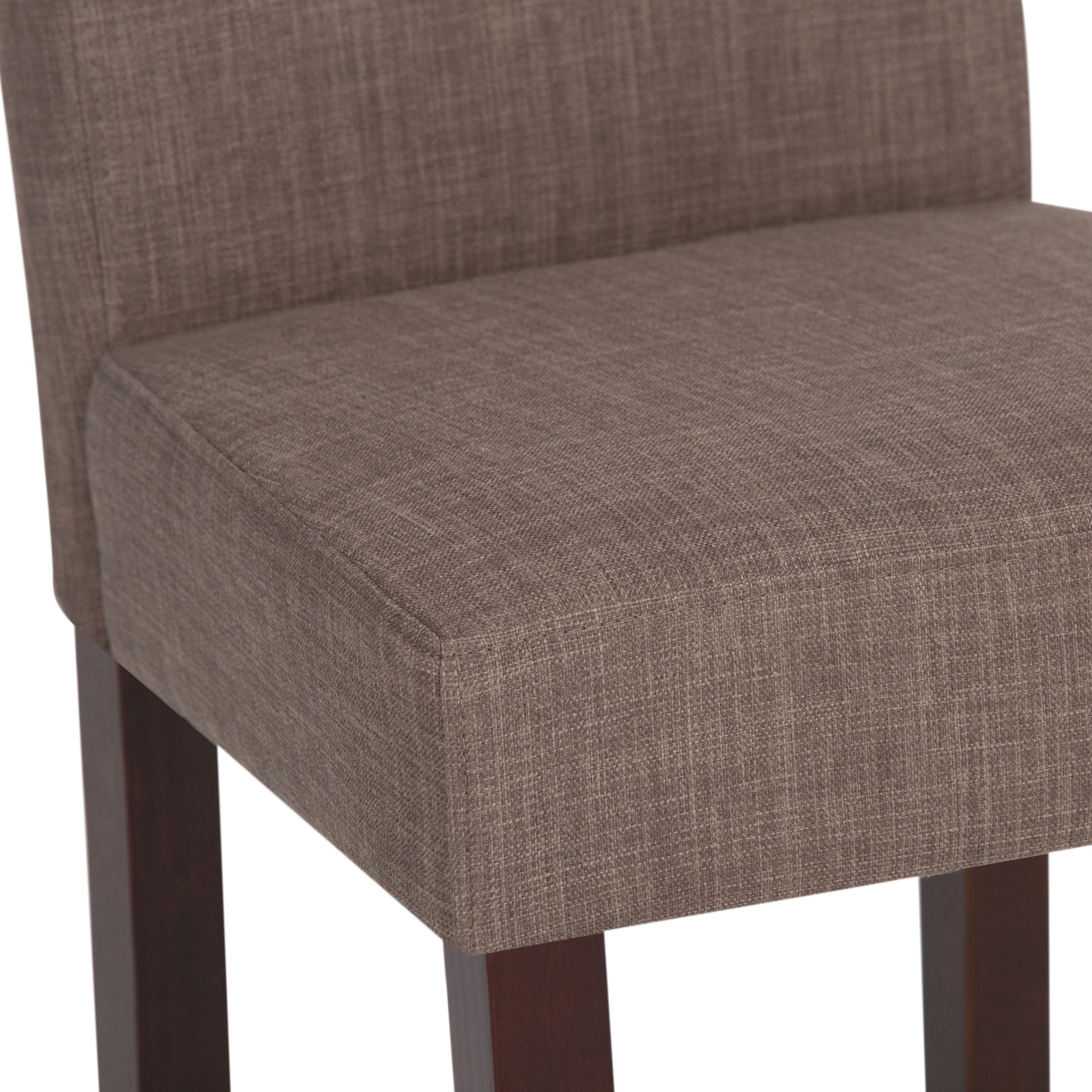 A close-up of the Acadian - Upholstered Parson Dining Chair (Set of 2), featuring brown textured fabric, dark wooden legs, a straight back, and a simple modern design.