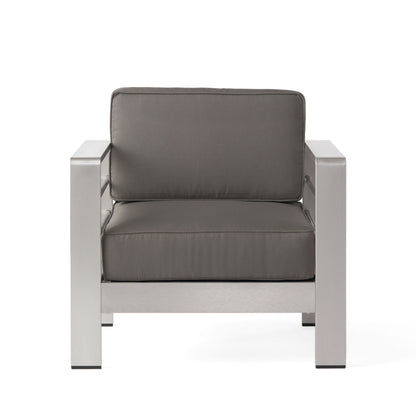 The Outdoor Aluminum Club Chair With Cushion - Gray features a modern metal frame, wide armrests, and thick dark gray seat and back cushions, shown from the front against a white background.