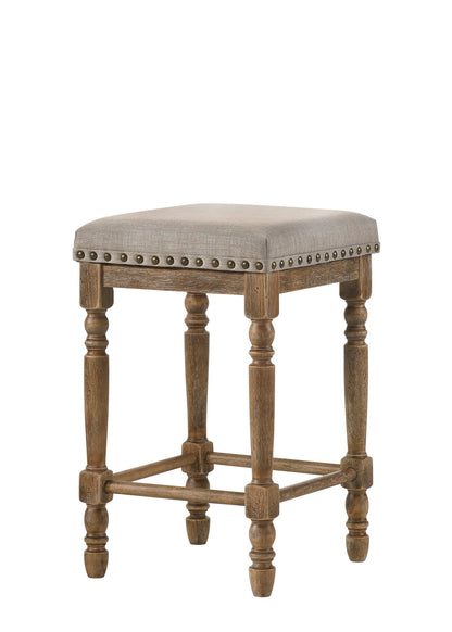 The Farsiris Weathered Counter Height Stool (Set of 2) features four turned legs with footrests, a square beige cushioned seat, and decorative nailhead trim along the edges.