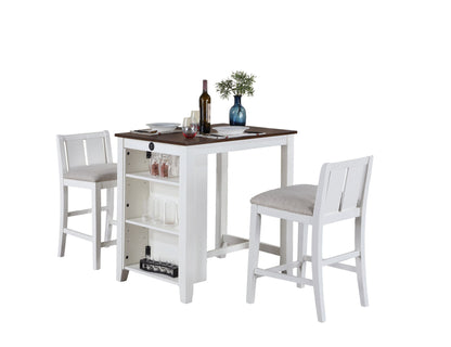The Graham 3 Piece Small Space Counter Height Dining Table Set includes a white table with built-in shelves and two cushioned white chairs, shown styled with wine bottles, glasses, plates, and a blue vase with greenery.