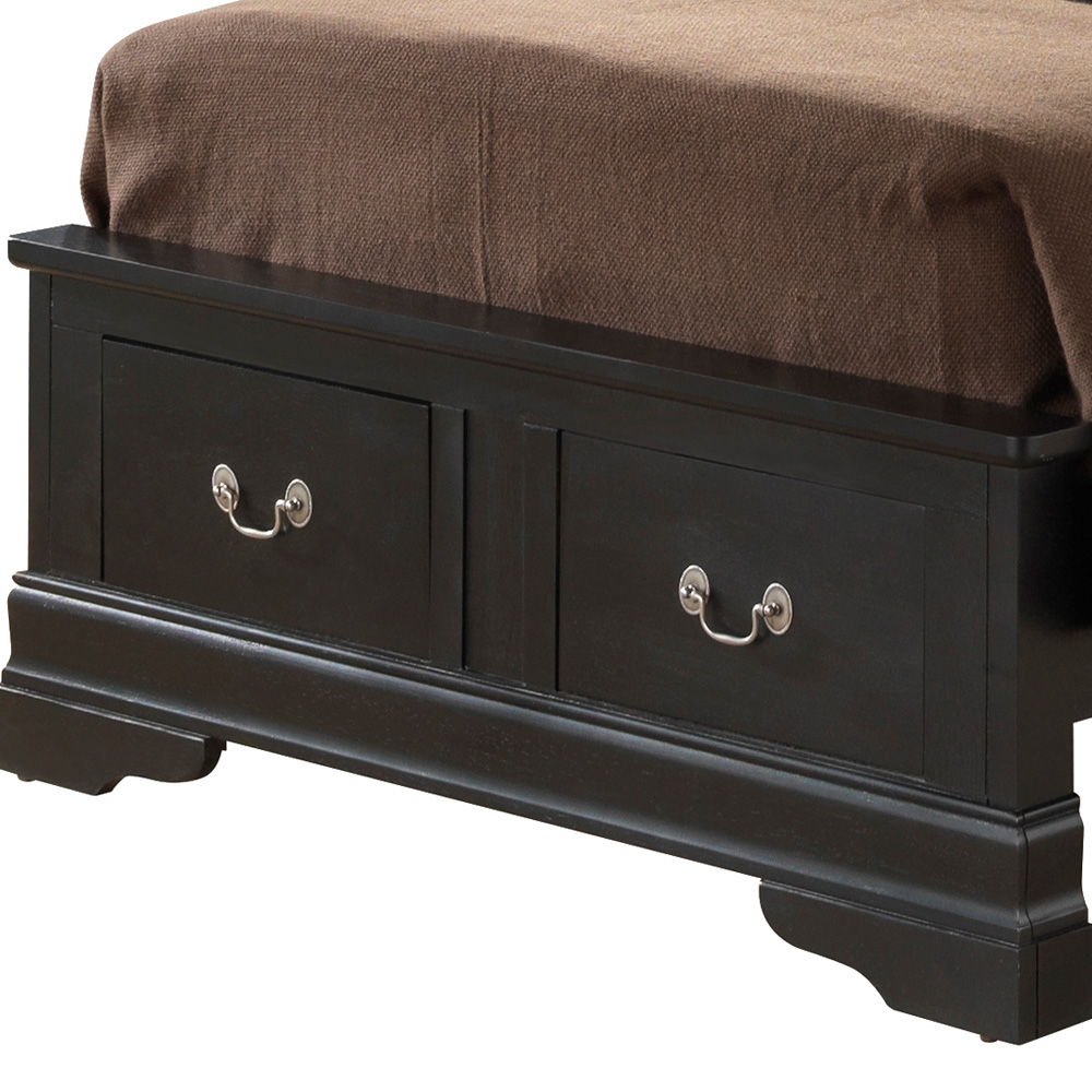 A close-up of the Louis Phillipe - Storage Bed’s dark wooden footboard with two drawers and silver handles, topped with a brown blanket.
