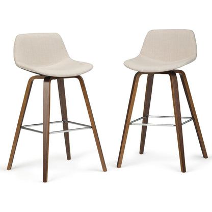 The Randolph Bentwood Counter/Bar Height Stool (Set of 2) features modern design with light beige upholstered seats, curved backs, brown-finished wooden legs, and metal footrests for added support.