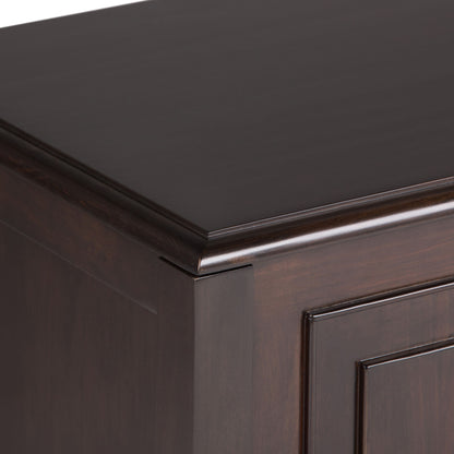 Close-up of the top corner and side of the Connaught - Handcrafted Storage Bench Trunk, showcasing its dark wood, smooth polished finish, and beveled edges.
