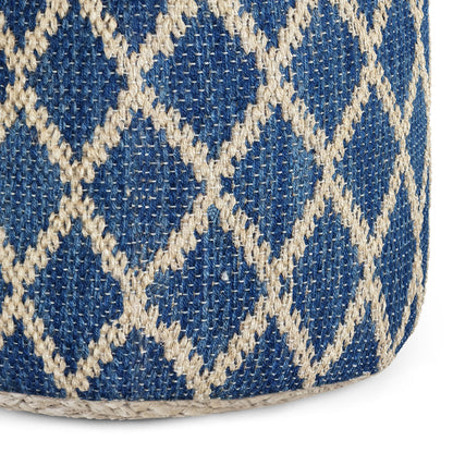 Close-up of the Edgeley - Handcrafted Round Pouf, featuring coarse woven fabric with a blue background and a cream diamond lattice pattern. The prominent stitches create a decorative, textured surface.