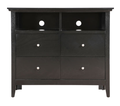 The Charming Media Chest With Storage is a black wooden dresser with four drawers featuring round silver knobs and two open shelves with circular back holes for cables. It stands on short legs.