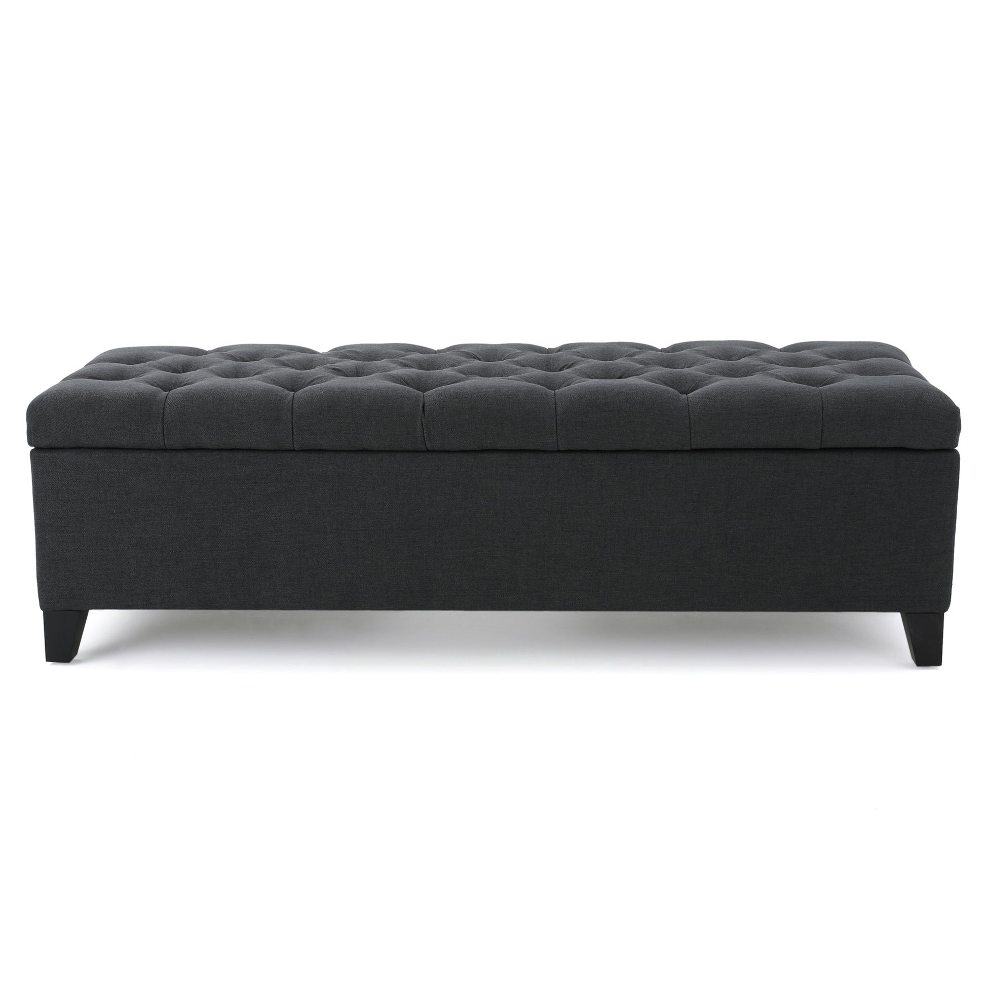 The Glouster Contemporary Storage Ottoman features a rectangular, dark gray button-tufted design with short black legs, displayed against a white background.